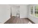 Bright living room with hardwood floors and large windows that let in lots of natural light at 56 Marlless Dr # A & B, Franklinton, NC 27525