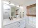 Bathroom featuring a double vanity and modern fixtures with tiled shower view at 612 E Ellerbee St, Durham, NC 27704