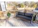 Outdoor patio with wicker furniture and plants, perfect for relaxing and entertaining at 612 E Ellerbee St, Durham, NC 27704