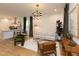 Bright open-concept living area featuring hardwood floors, modern furnishings, and seamless flow to the kitchen at 612 E Ellerbee St, Durham, NC 27704