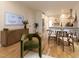 Open concept living area with a dining table, breakfast bar, hardwood floors and modern décor at 612 E Ellerbee St, Durham, NC 27704
