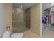 Modern bathroom featuring a glass-enclosed shower and walk-in closet at 618 N Boylan Ave # 304, Raleigh, NC 27603