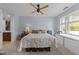Bright bedroom with ample natural light, stylish ceiling fan, and walk-in closet at 618 N Boylan Ave # 304, Raleigh, NC 27603