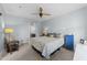 Inviting bedroom with a ceiling fan, natural light, and a comfortable sitting area for relaxing at 618 N Boylan Ave # 304, Raleigh, NC 27603
