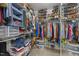Organized walk-in closet with ample storage space for clothes, shoes, and accessories at 618 N Boylan Ave # 304, Raleigh, NC 27603