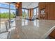 Bright kitchen with a view and marble counters with barstool seating at 618 N Boylan Ave # 304, Raleigh, NC 27603