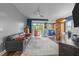 Open-concept living room featuring modern decor, access to a patio, and a seamless flow to the kitchen at 618 N Boylan Ave # 304, Raleigh, NC 27603