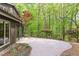 A brick patio offers ample space for outdoor entertaining with yard view at 635 Kensington Dr, Chapel Hill, NC 27514