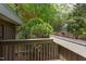 Balcony view showcasing lush greenery, providing a private outdoor space to unwind and connect with nature at 635 Kensington Dr, Chapel Hill, NC 27514