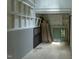 Unfinished basement space with shelving, awaiting your personal design at 635 Kensington Dr, Chapel Hill, NC 27514