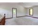 Bonus room featuring vaulted ceilings, a door to the deck, and a large window at 635 Kensington Dr, Chapel Hill, NC 27514
