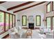 Bright living room with vaulted ceiling, fireplace, large windows, and comfortable seating at 635 Kensington Dr, Chapel Hill, NC 27514