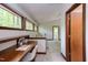 Hallway office space with built-in desk, natural light, and scenic views for a productive work environment at 635 Kensington Dr, Chapel Hill, NC 27514