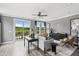 Elegant living room with comfortable seating, modern decor, and a view of the outdoor balcony at 668 Bandon Aly, Cary, NC 27513