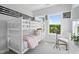 Bedroom featuring carpet, bunk beds, large window with a view of the outdoors, and white walls at 679 Bandon Aly, Cary, NC 27513