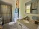 Bright bathroom featuring a shower and built-in vanity at 700 Sawmill Rd, Raleigh, NC 27615