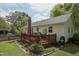 Lovely deck with a brick chimney and room for patio furniture at 700 Sawmill Rd, Raleigh, NC 27615