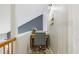 Cozy hallway features a desk, chair, and accent wall color for the perfect workspace at 7112 Benhart Dr, Raleigh, NC 27613