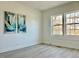 Minimalist bedroom with new floors, clean walls and lots of light at 808 E Hanover Rd, Graham, NC 27253