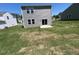 Spacious backyard offering potential for landscaping and outdoor enjoyment, great for gatherings at 817 Kenyon Springs Dr, Zebulon, NC 27597