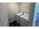 Convenient laundry area equipped with a washing machine and dryer for in-home laundry needs at 817 Kenyon Springs Dr, Zebulon, NC 27597