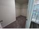Spacious walk-in closet with carpeted floors and ample shelving for storage at 817 Kenyon Springs Dr, Zebulon, NC 27597