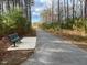 Enjoy the outdoors with this walking path with a bench for resting along the way at 817 Kenyon Springs Dr, Zebulon, NC 27597
