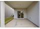 Back patio area with sliding glass door access at 82 White Ash Dr, Clayton, NC 27527