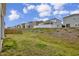 A picturesque view of the backyard showing the beautiful landscape and neighboring houses at 82 White Ash Dr, Clayton, NC 27527