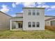 Back exterior of home, featuring a patio and nice green yard at 82 White Ash Dr, Clayton, NC 27527