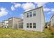 Back exterior of home, featuring a patio and nice green yard at 82 White Ash Dr, Clayton, NC 27527