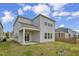 Back exterior of home, featuring a patio and nice green yard at 82 White Ash Dr, Clayton, NC 27527