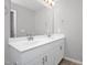Bathroom features a double sink vanity with white cabinets and silver fixtures at 82 White Ash Dr, Clayton, NC 27527