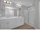 Modern bathroom featuring a double sink vanity and a glass shower at 82 White Ash Dr, Clayton, NC 27527
