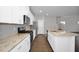 Beautiful kitchen with stainless steel appliances, white cabinets, and a spacious island at 82 White Ash Dr, Clayton, NC 27527