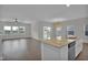 An open layout integrates the kitchen and living room with an airy and connected space at 82 White Ash Dr, Clayton, NC 27527