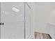 Bathroom showcases modern shower with sleek glass doors, and a bright vanity area at 821 Kenyon Spring Dr, Zebulon, NC 27597