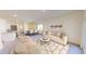 Inviting living space with neutral tones, an open floor plan, and stylish furnishings at 821 Kenyon Spring Dr, Zebulon, NC 27597