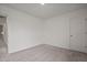 Neutral bedroom with carpet floors and a closet at 845 Kenyon Spring Dr, Zebulon, NC 27597