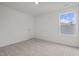 Bedroom featuring carpet floors, neutral paint, and one large window at 845 Kenyon Spring Dr, Zebulon, NC 27597