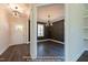 Inviting entryway features a stylish chandelier and white front door for a bright, welcoming feel at 85 Purslane Dr, Franklinton, NC 27525