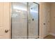 Frameless glass shower with a tiled surround at 85 Purslane Dr, Franklinton, NC 27525
