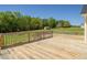 Large wooden deck offering a view of the surrounding pasture at 850 Cheatham Mabry Rd, Henderson, NC 27537