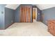 Comfortable bedroom with neutral carpet, closet, and wood trim at 850 Cheatham Mabry Rd, Henderson, NC 27537