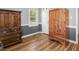 Bedroom featuring hardwood floors, natural light and closet space for a comfortable and inviting space at 850 Cheatham Mabry Rd, Henderson, NC 27537