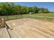 Expansive wood deck overlooking a well maintained and huge lawn area with trees in the distance at 850 Cheatham Mabry Rd, Henderson, NC 27537