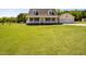 Charming Cape Cod-style home with a covered front porch and large lawn at 850 Cheatham Mabry Rd, Henderson, NC 27537