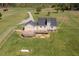 Home exterior featuring a large wooden deck and well-maintained lawn at 850 Cheatham Mabry Rd, Henderson, NC 27537
