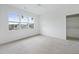 Bedroom filled with natural light, complemented by neutral walls at 8620 Dukes Lake Rd, Zebulon, NC 27597