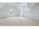 Bright bedroom featuring recessed lights, ceiling fan and large windows at 8620 Dukes Lake Rd, Zebulon, NC 27597